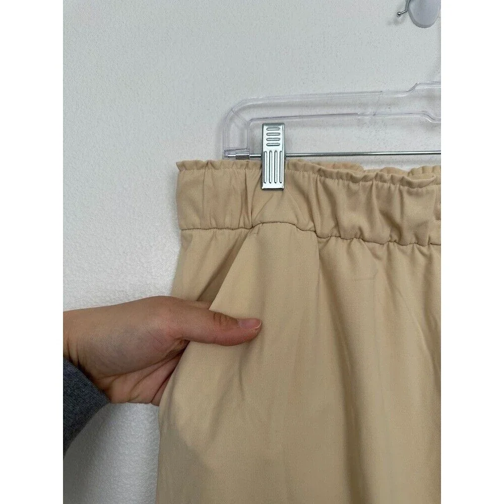 Lululemon Stretch High Rise Jogger in Beige Athleisure Tapered Pocket Women's 14